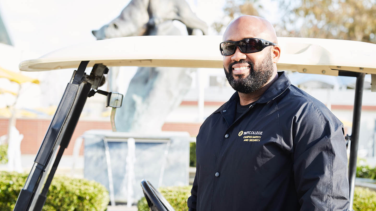 A Campus Security Officer ensures safety for all visitors and students across the campus.